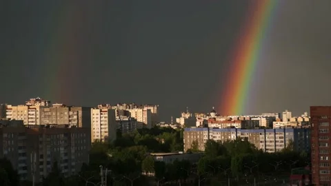 Rainbow over the city, double rainbow after rain Stock Footage 208065094