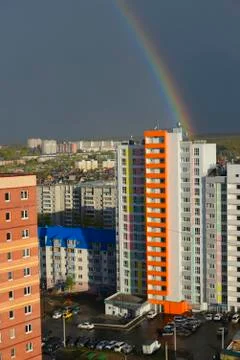 Rainbow over the city Stock Photos