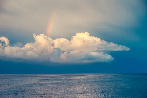 Rainbow over the clouds Stockfoto's