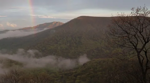 Rainbow Over Cloudy Valley Pan Stock Footage 23601184