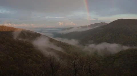 Rainbow Over Cloudy Valley Static Stock Footage 23604119
