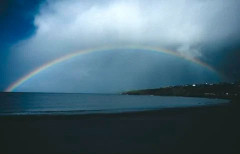 RAINBOW OVER COASTLINE Stock Photos