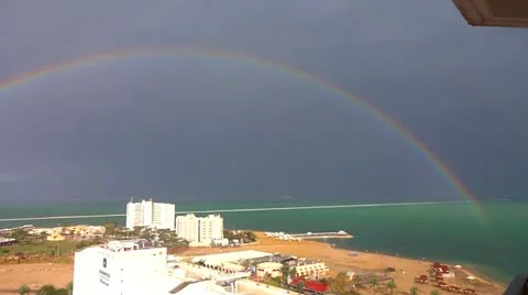 Rainbow over dead sea Stock Footage 21251211