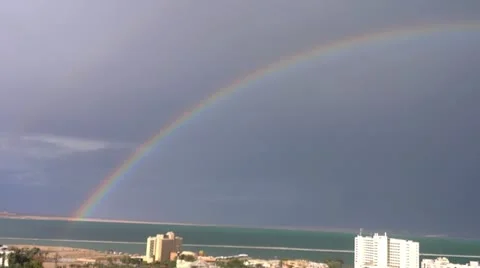 Rainbow over dead sea Stock Footage 21251289