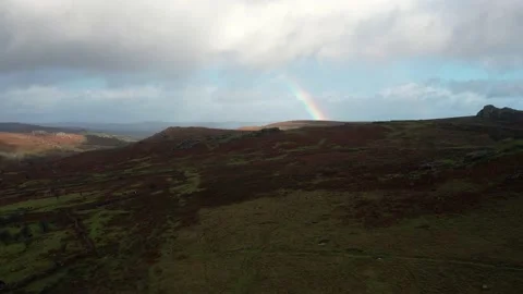 Rainbow over Emsworthy Mire, Haytor Rocks, Dartmoor National Park, UK Stock Footage 221025280