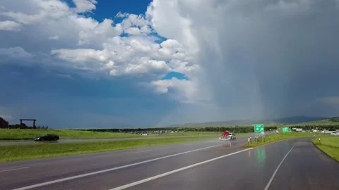 Rainbow over the fields and road Stock Footage 248119789