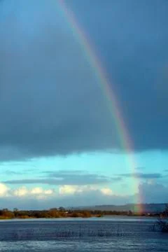 Rainbow over Floodwater Stock Photos