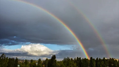 Rainbow Over the Forest. Time Lapse. Stock Footage 73509848