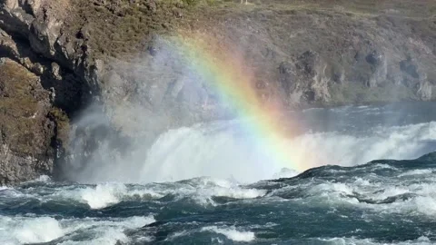 Rainbow over a glacial river in the Icelandic Highlands, dramatic landscape Stock Footage 336928899