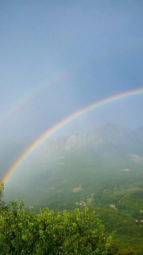 Rainbow Over Green Mountains After Summer Rain Video stock 343292698