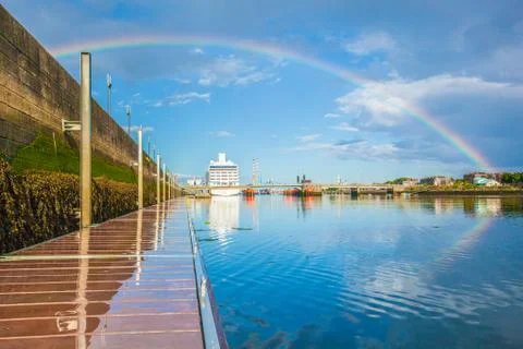 Rainbow over the harbour Foto stock
