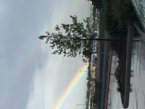 RainBow Over A Lake Stockfoto's