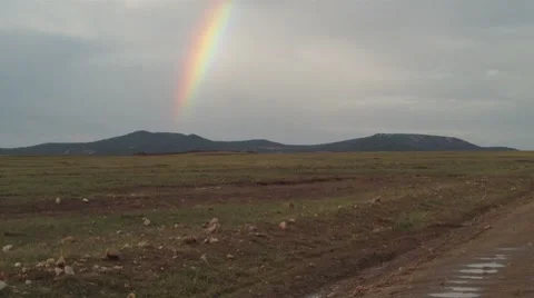 Rainbow over Masai Mara  (HD) Stock Footage 8694449