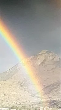 A rainbow over the mountain!!! Stock Photos