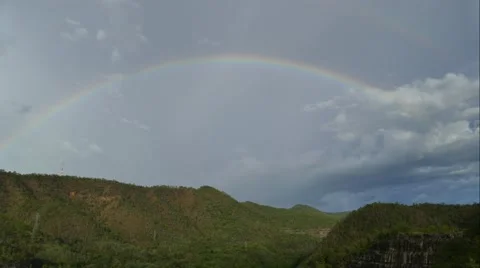 Rainbow over mountains. Video stock 65260004