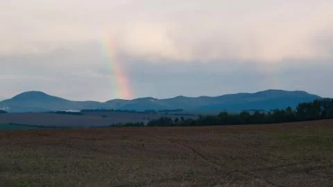 Rainbow over the mountains Stock Photos