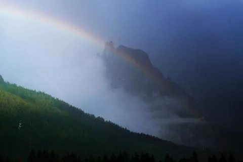 Rainbow over the mountains Stock Photos