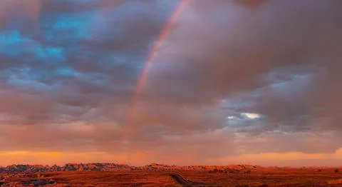 Rainbow over the mountains Stock Photos