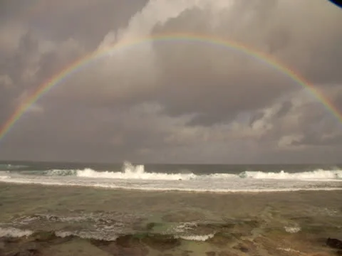 Rainbow over ocean Stock Footage 25825781