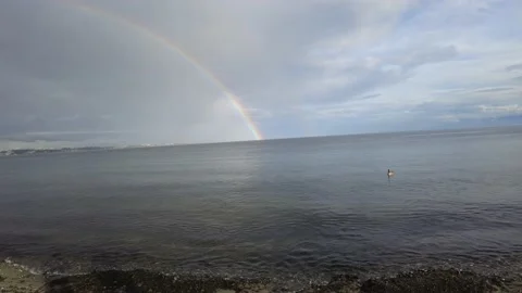 Rainbow over the ocean Video stock 162429965