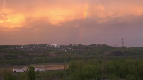 Rainbow over the river during sunset. the view from the mountains Stock-Footage 129697364