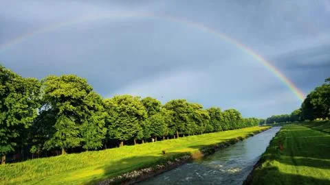 Rainbow over the river Stock Photos