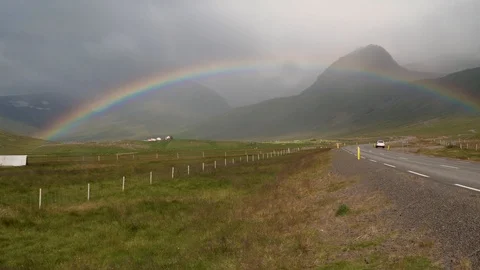 Rainbow over the road after rain Video stock 119660012