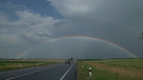 Rainbow over road Video stock 39993040