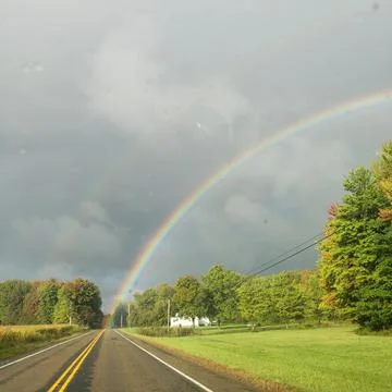 Rainbow over road 写真素材