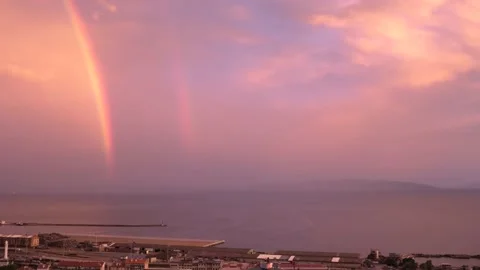 Rainbow over sea during sunset 스톡 동영상 202064462