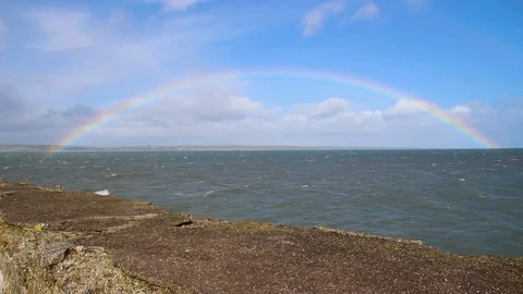 Rainbow over the sea Stock Footage 129232127