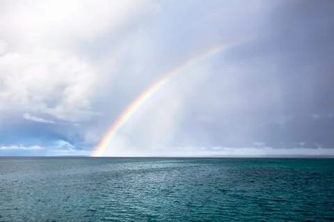 Rainbow over the sea Stock Photos