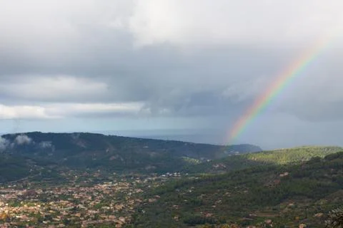 Rainbow over Soller Valley surrounded by the Serra de Tramuntana mountains Stock Photos