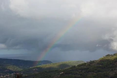 Rainbow over Soller Valley surrounded by the Serra de Tramuntana mountains Stock Photos