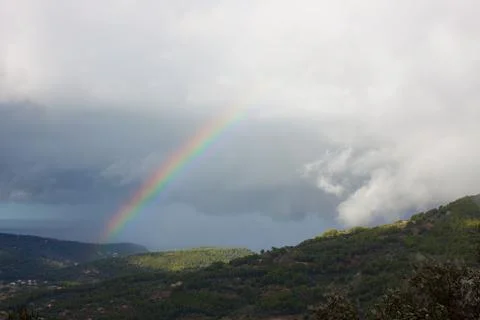 Rainbow over Soller Valley surrounded by the Serra de Tramuntana mountains Stock Photos