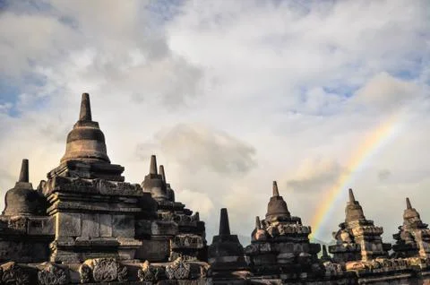 Rainbow over stupa buddist temple borobudur complex in yogjakarta in java Stock Photos