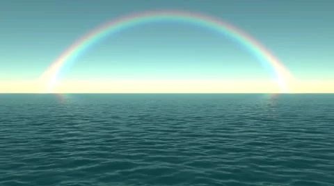 Rainbow over the water of the ocean during the day. Loop background. Stock Footage 40552550