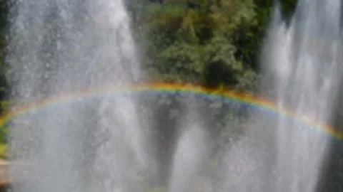 Rainbow over water splashes Video stock 131081072