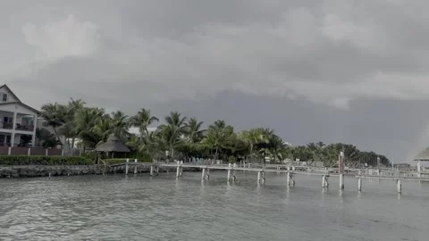 Rainbow Over Waterfront Pier in Caye Caulker Belize Vídeos de archivo 335169788