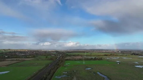 Rainbow over Wetlands from a drone, RSPB Exminster and Powderham Marshe Stock Footage 221647016