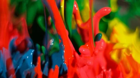 Rainbow paint splatter macro background Stock Photos