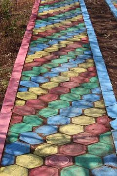 Rainbow path leads to beautiful destination Stock Photos
