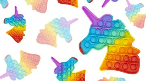 Rainbow pattern simple dimple in the form of a unicorn on a white background Stock Photos