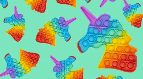 Rainbow pattern simple dimple in the form of a unicorn on mint green background Stock Photos