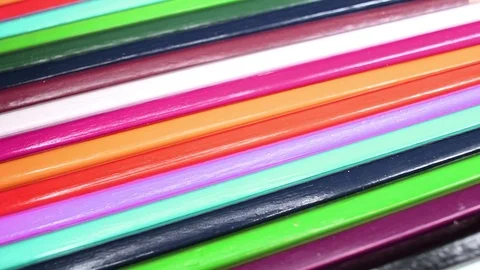 Rainbow pencils rotating texture pattern closeup footage Video stock 97234755