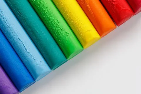 Rainbow plasticine background. Top view of modeling clay. Craft and art conce Stock Photos