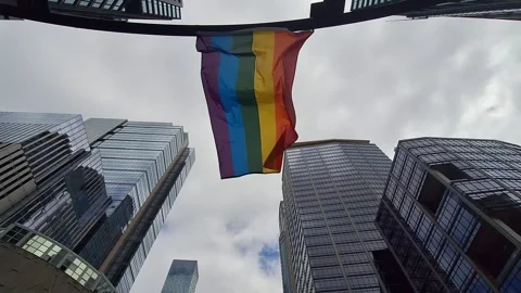 Rainbow Pride Flag Hangs Between City Skyscrapers Stock Footage 346348449