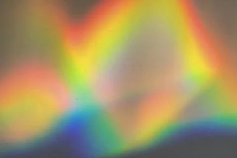 Rainbow prism reflected through water creates vibrant wavy image 6 Stock Photos
