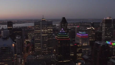 Rainbow Pyramid High-Rise Lights Over River at Early Night Stock Footage 345269047