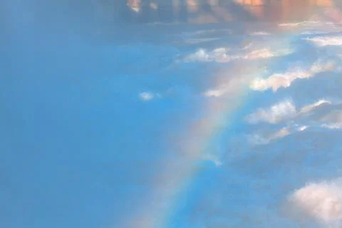 Rainbow reflection in the water Stock Photos